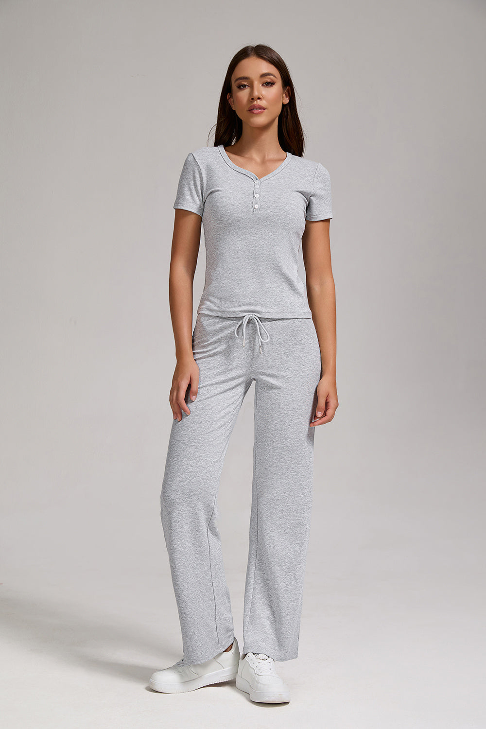 Women's Casual Sports Two-piece Set With V-neck Button, Short Sleeved, Low Waisted Flared Pants, Sportswear